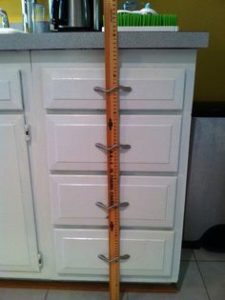ruler baby proof cabinets