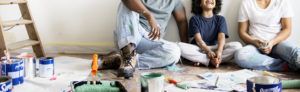 family painting in bedroom together